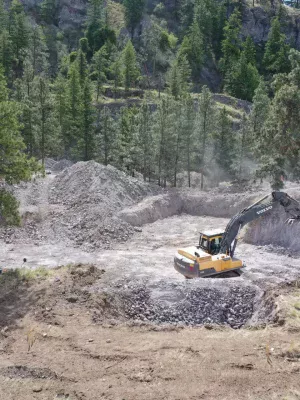 Doug Bateman excavating site on bluffs